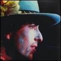 A person wearing a hat
Description automatically generated