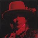A person wearing a hat
Description automatically generated