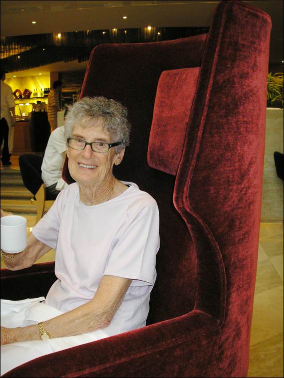 A person sitting in a red chair

AI-generated content may be incorrect.