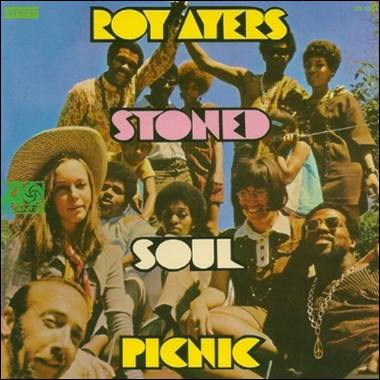 A group of people posing for a photo

Description automatically generated