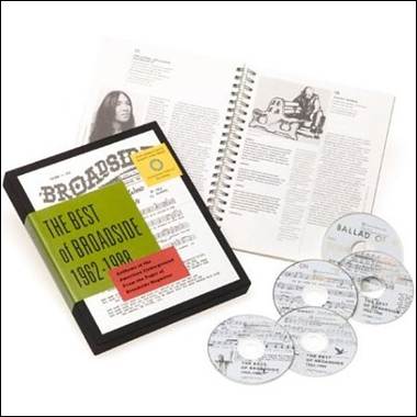 A book and cd's next to a book

Description automatically generated