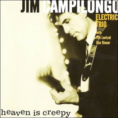 A person holding a guitar

Description automatically generated