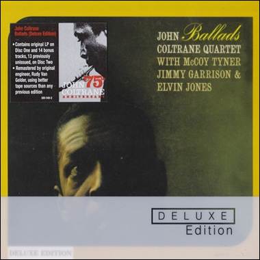 A yellow and black cd cover

Description automatically generated