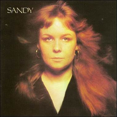 A person with long red hair

Description automatically generated