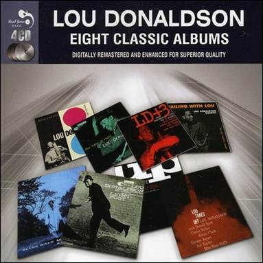 A group of cd's on a white background

Description automatically generated