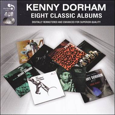 A group of cd's on a white surface

Description automatically generated