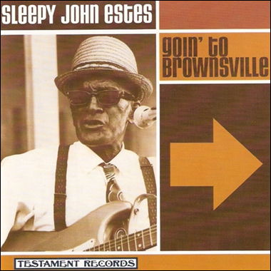 An old person playing a guitar

Description automatically generated