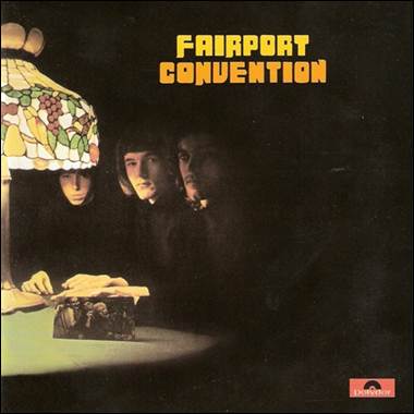 A group of people looking at a lamp

Description automatically generated