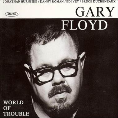 A person with glasses and a mustache

Description automatically generated