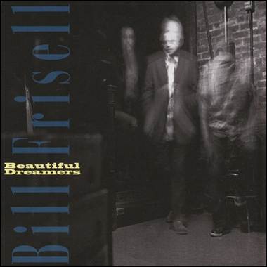 A blurry image of a person standing in a dark room
Description automatically generated