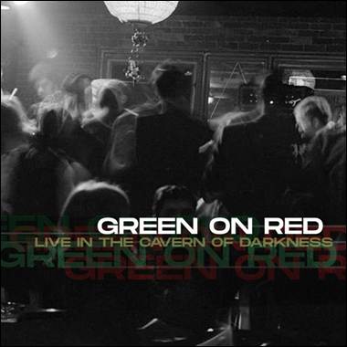 A group of people in a dark room

Description automatically generated