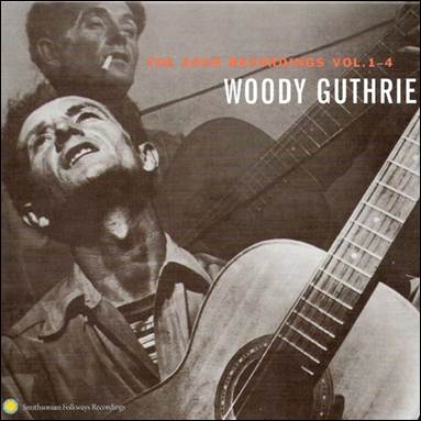 A person holding a guitar

Description automatically generated