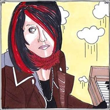 A person with red hair and black hair

Description automatically generated