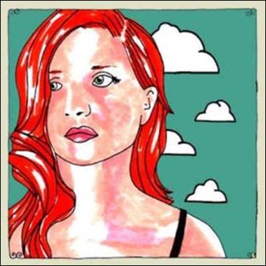 A person with red hair

Description automatically generated