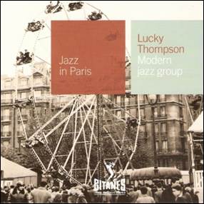 A group of people in front of a ferris wheel
Description automatically generated