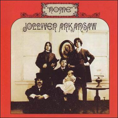 A group of men and a baby
Description automatically generated