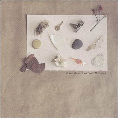 A collection of objects on a white surface

Description automatically generated