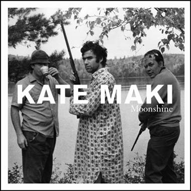 A group of people standing next to a body of water

Description automatically generated