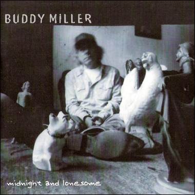 A person sitting in a chair with two dogs

Description automatically generated