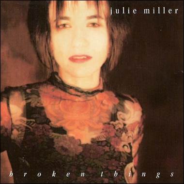 A person in a floral dress

Description automatically generated