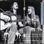 A person and person singing and playing guitar

Description automatically generated