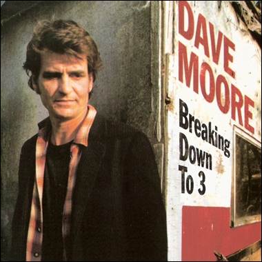 A person standing in front of a sign

Description automatically generated