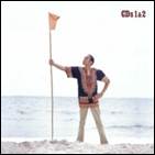 A person holding a flag on a beach

AI-generated content may be incorrect.