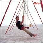 A person on a swing on a beach

AI-generated content may be incorrect.
