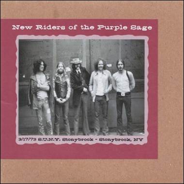 A group of men standing in front of a building
Description automatically generated