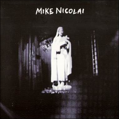 A statue of a person on a stage

Description automatically generated