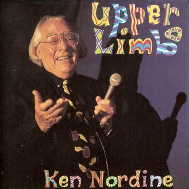 A person holding a microphone
Description automatically generated