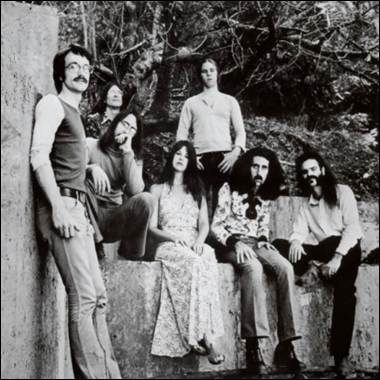 A group of people posing for a photo

Description automatically generated