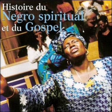 A person in a blue dress and head wrap

Description automatically generated