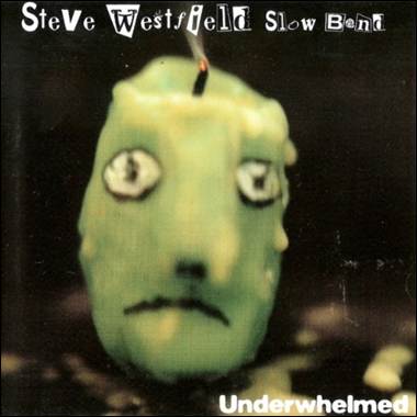 A candle with a face on it

Description automatically generated