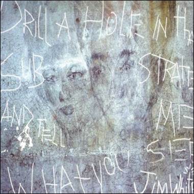 A close-up of a wall with writing

Description automatically generated