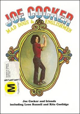 A person in a red shirt
Description automatically generated