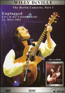 A person playing a guitar
Description automatically generated