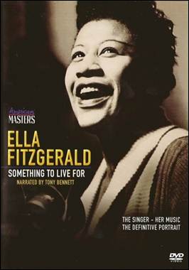 A person singing on a magazine cover
Description automatically generated