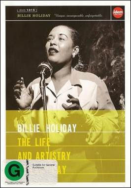 A person singing into a microphone
Description automatically generated