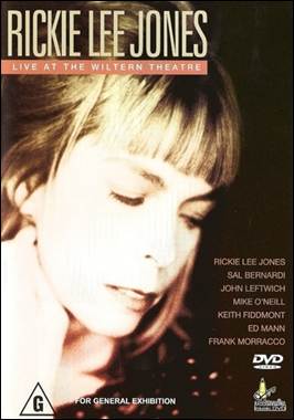 A person with her eyes closed
Description automatically generated