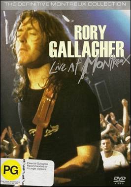 A person with long hair and a guitar
Description automatically generated