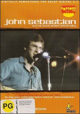 A person singing into a microphone
Description automatically generated