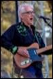 A person playing a guitar

Description automatically generated with medium confidence
