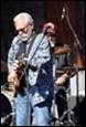 A picture containing clothing, person, concert, musical instrument

Description automatically generated