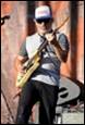 A person playing a guitar

Description automatically generated with medium confidence