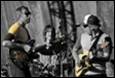 A group of people playing guitars

Description automatically generated with medium confidence