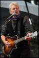 A person playing guitar and singing

Description automatically generated with low confidence