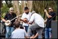A group of people playing instruments

Description automatically generated with medium confidence