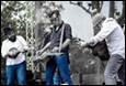 A group of men playing guitar

Description automatically generated with low confidence