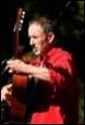 A person playing a guitar

Description automatically generated with medium confidence